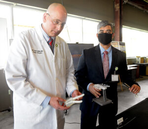 Legislators, business leaders get a look at medical technology innovation company Intermed Labs at Mon Health